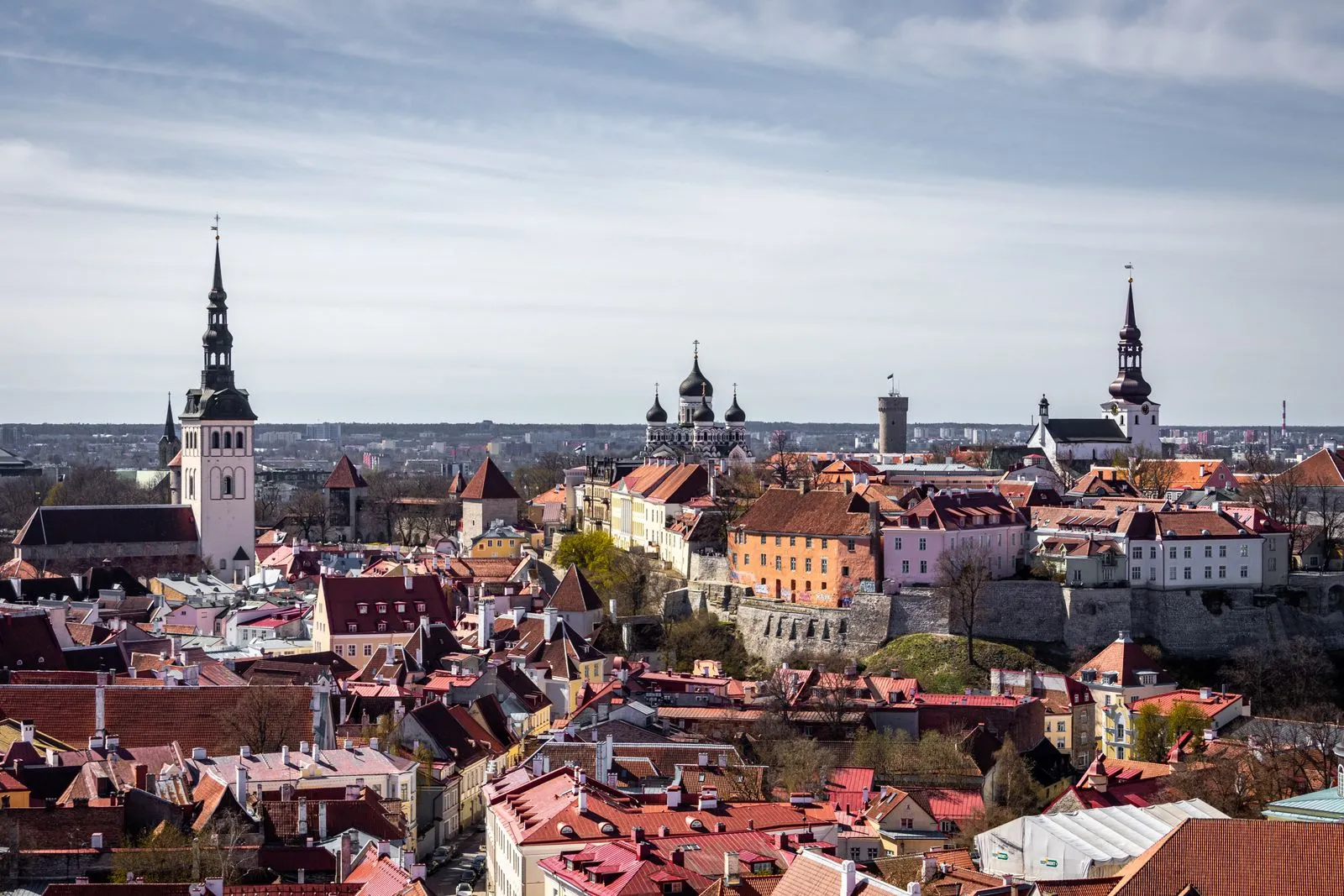 Aerial view of Tallinn Old Town with red rooftops and medieval towers
