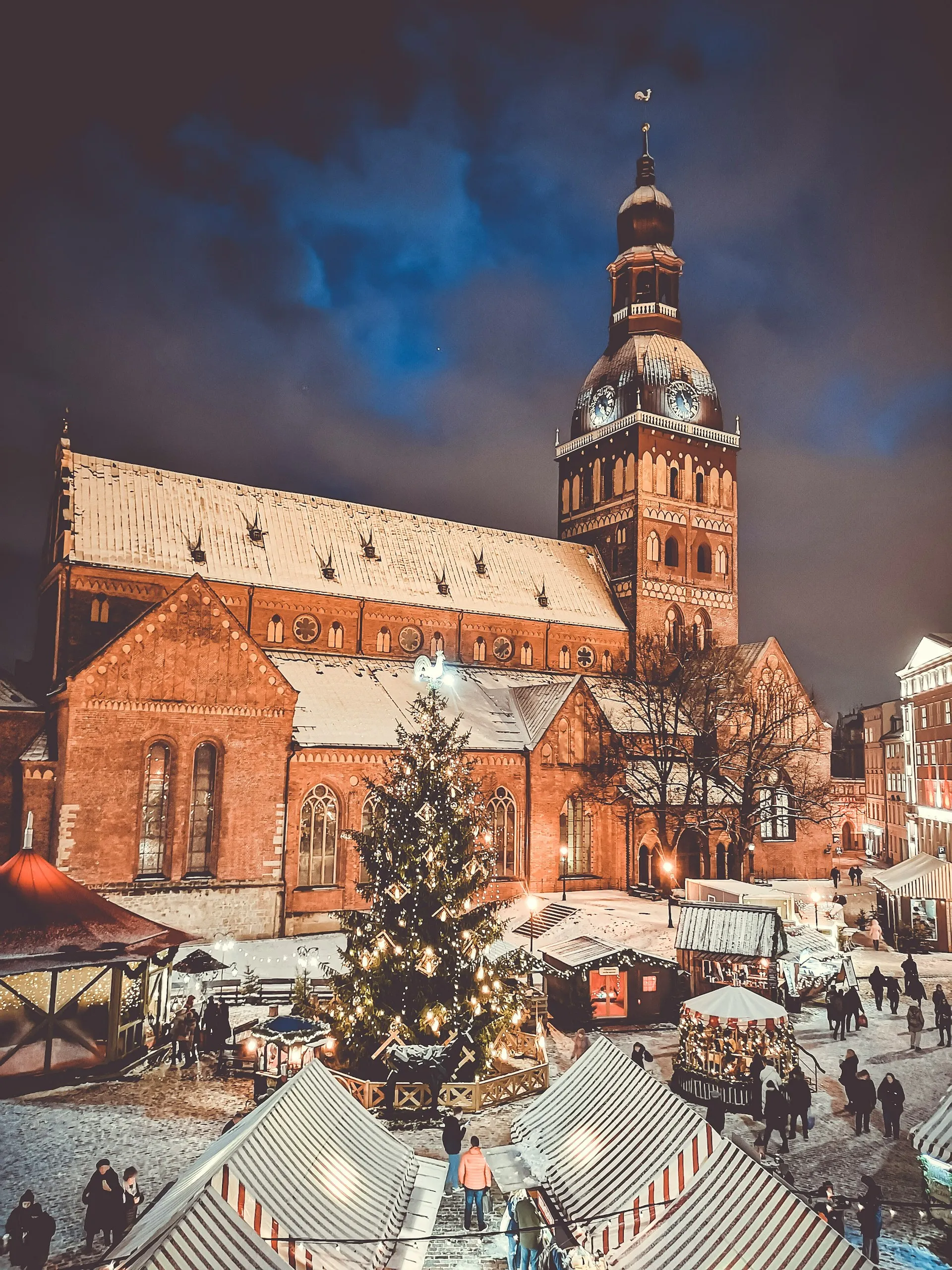 Dome Square in Riga's Old Town, with the Dome Cathedral and cobblestone streets on a sunny day