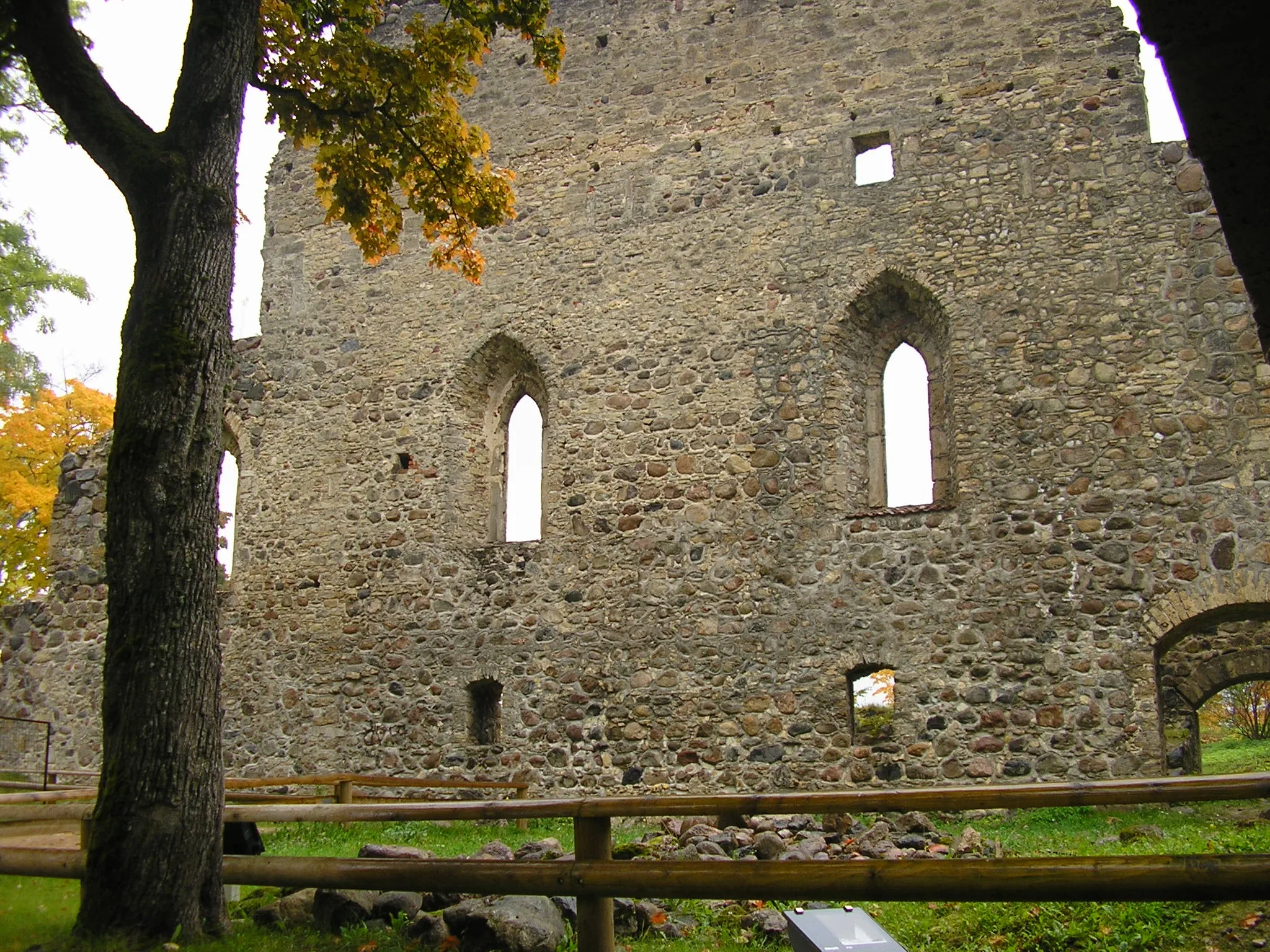 Sigulda Castle in Gauja National Park, a brick and stone fortress on a hill above the Gauja river valley
